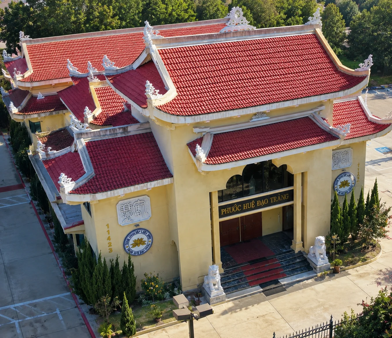 Traditional temple with red and yellow architecture.